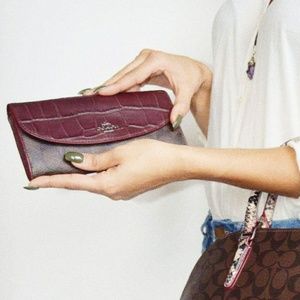 Coach monogram brown wallet with exotic trim